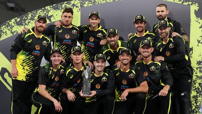 The Australian team pose with the winner's trophy after defeating Sri Lanka 4-1 in the T20 series. AP