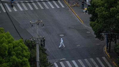 Shanghai roads are free of traffic as transport is confined to health workers and people needing emergency treatment. AFP