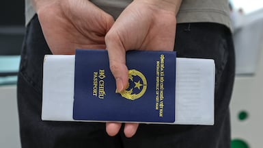 There is a short grace period for an old visa to be cancelled, but a person cannot work for a new employer in the UAE without obtaining a new residency visa. Victor Besa / The National