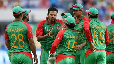 Mashrafe Mortaza, centre, expressed his pride at Bangladesh's achievements at the cricket World Cup. Rick Rycroft / AP Photo