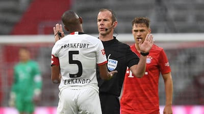 Frankfurt midfielder Gelson Fernandes debates with referee Marco Fritz. AFP