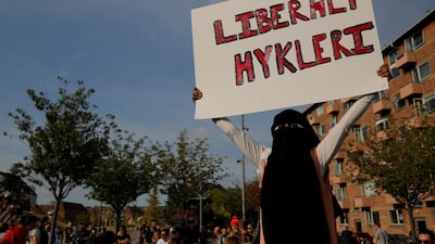 People participate in a demonstration against the Danish face veil ban. Reuters