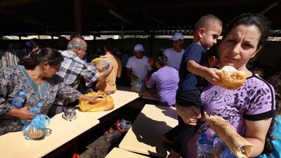 Iraqi Christians who fled persecution from ISIL militants are being used by the far right in the US to push a warmongering agenda. Photo: Safin Hamed / AFP