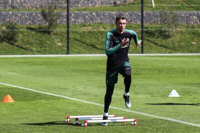 Cristiano Ronaldo performs during his team's training session at Cidade do Futebol in Oeiras, near Lisbon. Antonio Cotrim / EPA