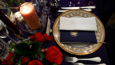 An example of the table setting and floral arrangement for Thursday evening's State Dinner. EPA