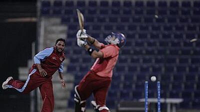 Mohammed Asif sees his middle stump fall back after being bowled by UAE Exchange Centre's Mohammed Kashif.