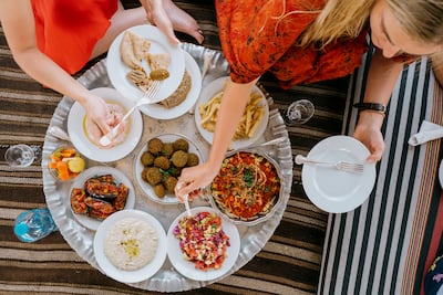 A traditional lunch is served on the low-slung couches and tables on the deck of the 'Adelaide'. Erin Clare Brown / The National