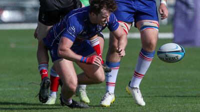 Cian Buckley of Jebel Ali Dragons drops the ball during the West Asia Premiership game against Abu Dhabi Harlequins. Victor Besa / The National