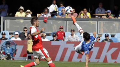 MLS All-Stars’ David Villa, right, of New York City FC, makes a scissor kick next to Arsenal’s Mathieu Debuchy during the first half of the MLS All-Star game Thursday, July 28, 2016, in San Jose, California. Marcio Jose Sanchez / AP Photo