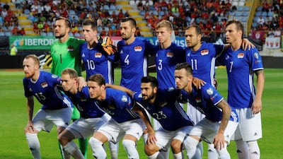 Liechtenstein’s national soccer team pose before match. Eloy Alonso / Reuters