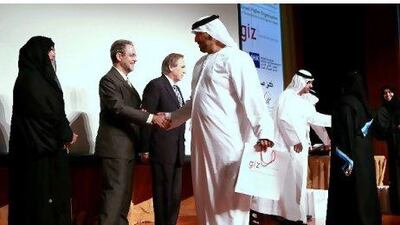 The new instructors receive their certificates. Delores Johnson / The National