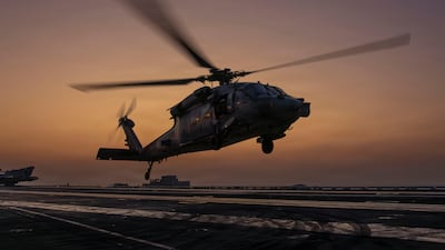 An MH-60S Sea Hawk helicopter takes off from aircraft carrier the USS Abraham Lincoln in support of "Operation Epic Fury" on March 4. AFP