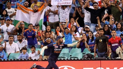 India's Hardik Pandya takes a catch at the boundary line to dismiss Australia's Steve Smith. AFP