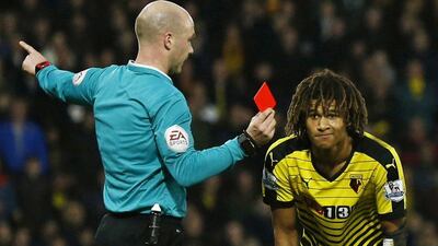 Football Soccer - Watford v Tottenham Hotspur - Barclays Premier League - Vicarage Road - 28/12/15Watford's Nathan Ake is shown a red card by referee Anthony Taylor Reuters / Eddie KeoghLivepicEDITORIAL USE ONLY. No use with unauthorized audio, video, data, fixture lists, club/league logos or "live" services. Online in-match use limited to 45 images, no video emulation. No use in betting, games or single club/league/player publications. Please contact your account representative for further details.