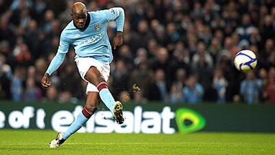 Mario Balotelli scores City's second in their 3-0 win against Aston Villa in the FA Cup.