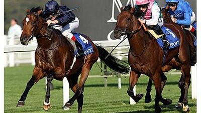 Rip van Winkle, left, ridden by Johnny Murtagh, pulls clear of the field during The Queen Elizabeth II Stakes at Ascot.