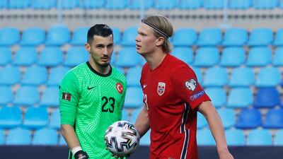 Norway's Erling Braut Haaland and Turkey goalkeeper Ugurcan Cakir. Reuters