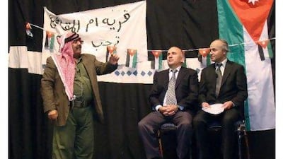 The Jordaian comedian Musa Hijazin, left, as Abu Saqr, Heorge Hijazin, centre, as Jordan's prime minister and Hikmat Daewish impersonating a senior official in the play Now I Understand You.