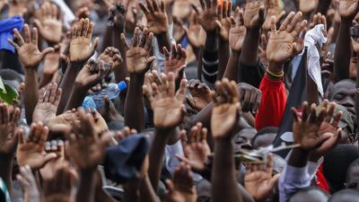 Supporters of the Kenyan Coalition for Reforms and Democracy (CORD) led by former prime minister Raila Odinga, also the leader of the Orange Democratic Movement (ODM), raise their hands as they react to Odinga’s speech during the Saba Saba (or Seven-Seven in Swahili language) rally held in central Nairobi, Kenya, 07 July 2014. Dai Kurokawa / EPA
