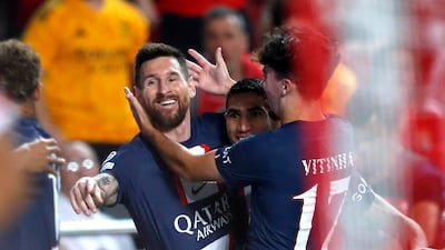 Lionel Messi celebrates scoring the PSG goal, Reuters