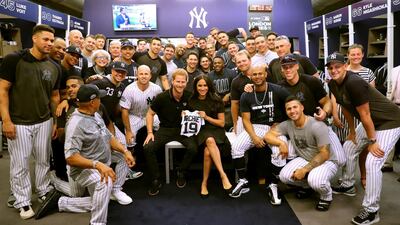 LONDON, ENGLAND - JUNE 29: In this handout image provided by The Invictus Games Foundation, Prince Harry, Duke of Sussex and Meghan, Duchess of Sussex join the New York Yankees in their Clubhouse and receive gifts for Archie ahead of their match against the Boston Red Sox at the London Stadium in London, England. The historic two-game "You Just Cant Beat The Person Who Never Gives Up" series marks the sports first games ever played in Europe and The Invictus Games Foundation has been selected as the official charity of Mitel and MLB London Series 2019. Getty Images