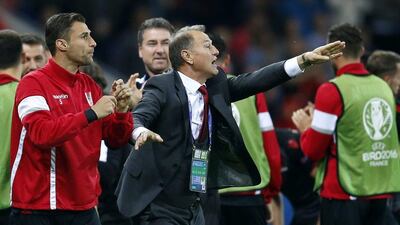 Albania coach Gianni De Biasi gestures from the sidelines. Yuri Kochetkov / EPA