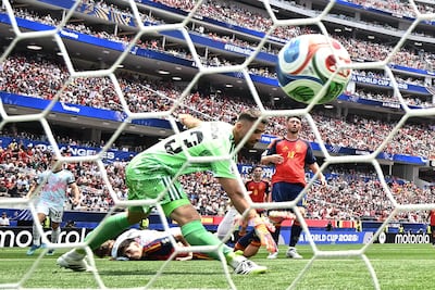 Spain goalkeeper Unai Simon concedes a goal for the first time at this World Cup to Belgium's Charles De Ketelaere. AFP