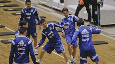 Argentina's players train on the hardcourt of Polyvalent Hall in Bucharest, Romania. The hall has hosted music acts such as Deep Purple, Gorillaz and The Chemical Brothers in the last decade. Vadim Ghirda / AP