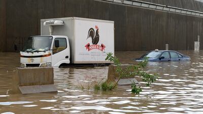 Vehicles are stuck in a flooded tunnel after a heavy downpour on the main road near Rafic Hariri International Airport at the southern entrance of Beirut. EPA