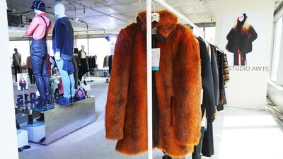 A scene-stealing fiery orange coat shown at the H&M AW15 studio collection press preview. Courtesy Hafsa Lodi