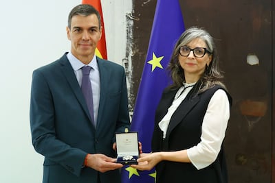 Spanish Prime Minister Pedro Sanchez awards the Order of Civil Merit to Francesca Albanese. AFP