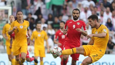 Australia defender Milos Degenek, right, in action during the Asian Cup clash. AFP