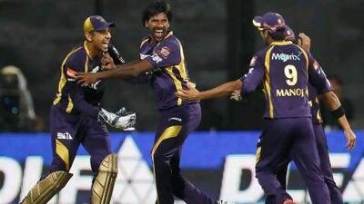 Lakshmipathy Balaji, second left, took four wickets for the Kolkata Knight Riders.