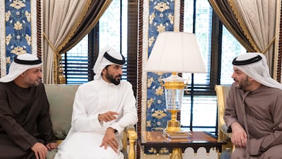 Faisal Al Bannai, Adviser to President Sheikh Mohamed for Strategic Research and Advanced Technology Affairs, and Sheikh Mohammed bin Hamad, Adviser to Sheikh Mohamed, speak to Sheikh Nasser bin Hamad, Bahrain's National Security Adviser and Commander of the Royal Guard