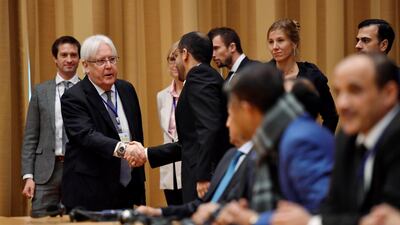 UN envoy to Yemen Martin Griffiths shakes hands with Yemeni delegates at the opening press conference on UN-sponsored peace talks for Yemen. TT News Agency via Reuters