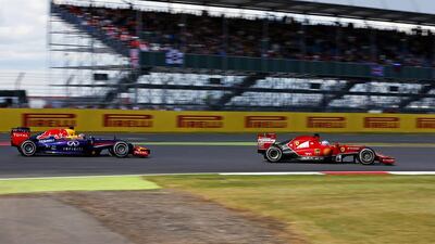 Spanish Formula One driver Fernando Alonso of Ferrari, right, shown during Sunday's British Grand Prix. Valdrin Xhemaj / EPA / July 6, 2014