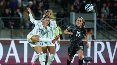 Philippines midfielder Jaclyn Sawicki, left, fights for the ball with New Zealand's 10 Annalie Longo. AFP