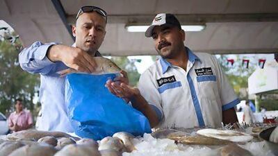Mohamed Eid, the owner of Sea Mood Restaurant in Dubai, promotes the idea of sustainable seafood to protect stocks. Razan Alzayani / The National