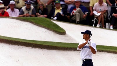 Tiger Woods in a bunker on the seventh hole during the second round. AFP
