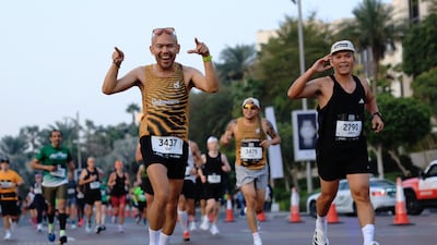 Runners happy to be seen participating in the Dubai Marathon 2026