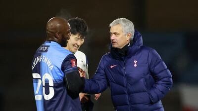 Tottenham Hotspur manager Jose Mourinho with Wycombe Wanderers' Adebayo Akinfenwa Tottenham Hotspur's Son Heung-min after the match. Reuters