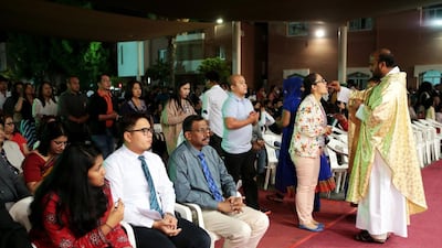 Thousands of Catholics, dressed in their finest attire, thronged to the church in the capital to attend the service and offer prayers. Christopher Pike / The National