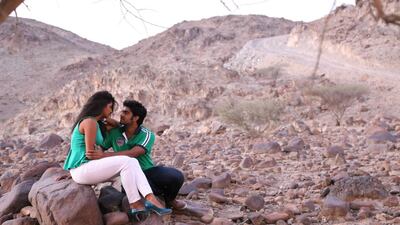 Dubai actors Adil Ibrahim and Sudhakshina Shivkumar in a scene from the Indian movie Persiakkaran – their first film – in a still taken from a sequence filmed in Fujairah. Courtesy New TV Productions