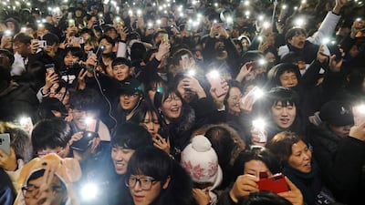 People attend a ceremony to celebrate the new year in Seoul, South Korea, January 1, 2019. Reuters
