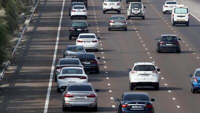 Morning commuters head from Dubai towards Abu Dhabi as traffic builds up. Chris Whiteoak / The National