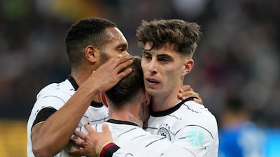 Kai Havertz celebrates with teammates after scoring Germany's opening goal against Israel. AP
