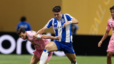 Porto's Gabri Veiga tackles Lionel Messi of Inter Miami during the Club World Cup in Atlanta. Getty Images