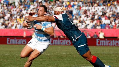 Argentina's full back Joaquin Tuculet (L) is tackled by US centre Paul Lasike during the Japan 2019 Rugby World Cup Pool C match between Argentina and the United States at the Kumagaya Rugby Stadium in Kumagaya. AFP