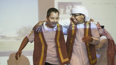 The students of Zayed Higher Organisation enjoy dancing at the charity bazaar of Humanitarian Care and Special Needs. It featured crafts they made in their workshop classes. Mona Al Marzooqi / The National