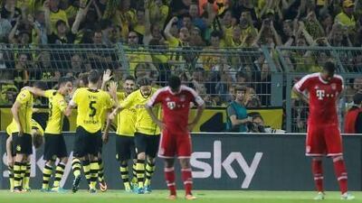 Dortmund gave their fans plenty to cheer about during a 4-2 victory over Bayern Munich in the German Super Cup on Saturday. Frank Augstein / AP Photo
